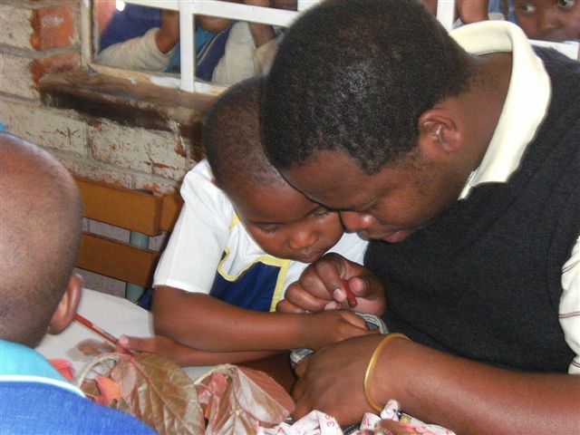 Learner with Dad at one of the workshops