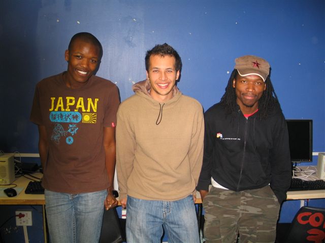 Three NMMU IT students who networked and set up the donated DELL computers in each school